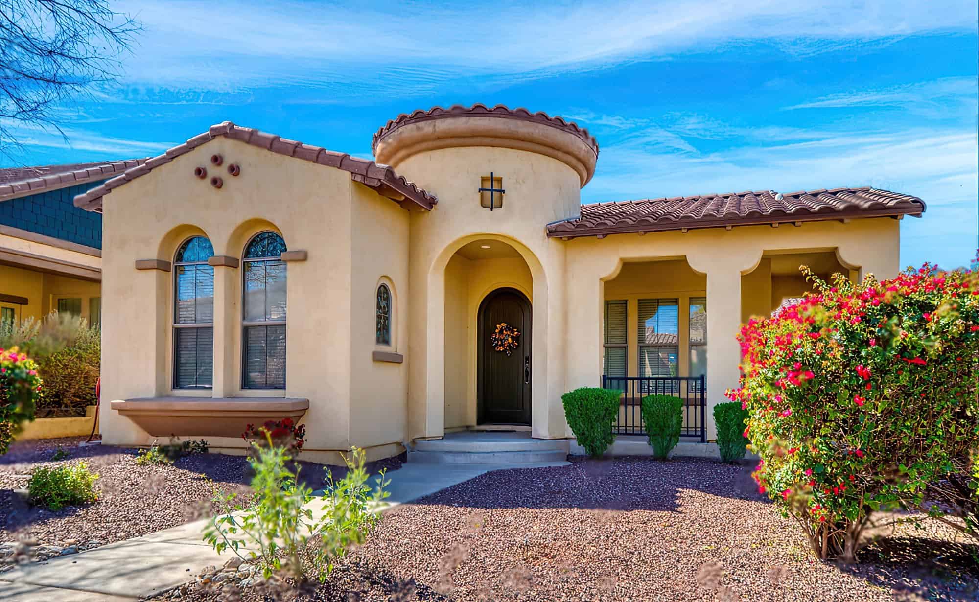 unique style yellow painted stucco house